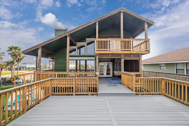 wooden deck featuring french doors