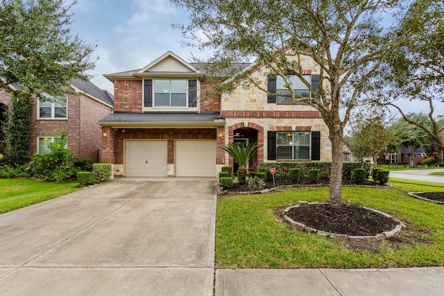 view of front of home featuring a garage and a front yard