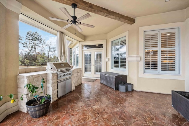 view of patio featuring french doors, an outdoor kitchen, ceiling fan, and area for grilling