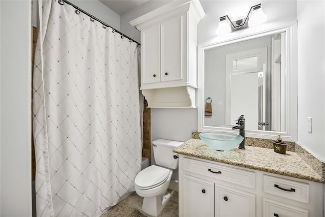 full bathroom featuring vanity, toilet, and shower / bath combo