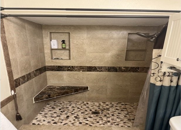 bathroom featuring walk in shower