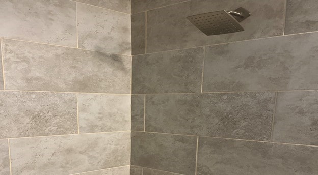 room details with a tile shower