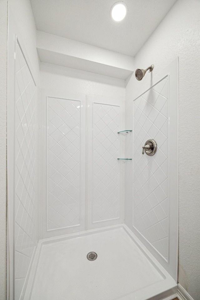 bathroom featuring walk in shower