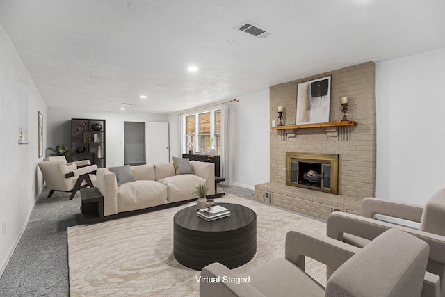 living room with recessed lighting, visible vents, a brick fireplace, carpet flooring, and baseboards