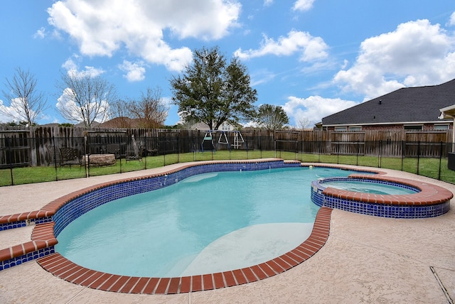 view of pool with a fenced backyard, a yard, and a patio