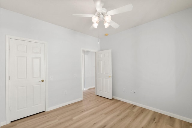 unfurnished room with light hardwood / wood-style floors and ceiling fan