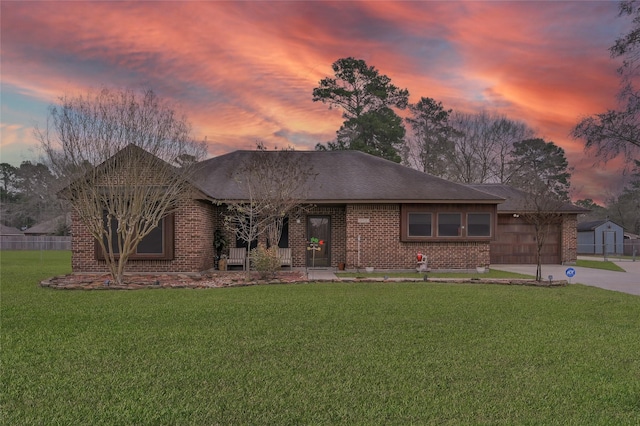 view of front of property with a yard