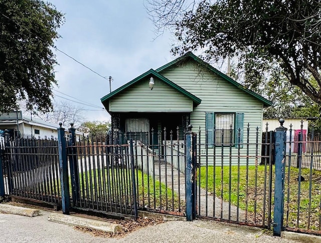 bungalow with a front yard