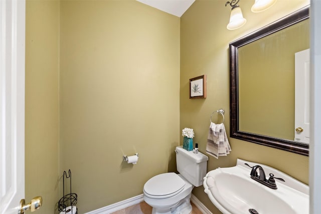 bathroom with sink and toilet