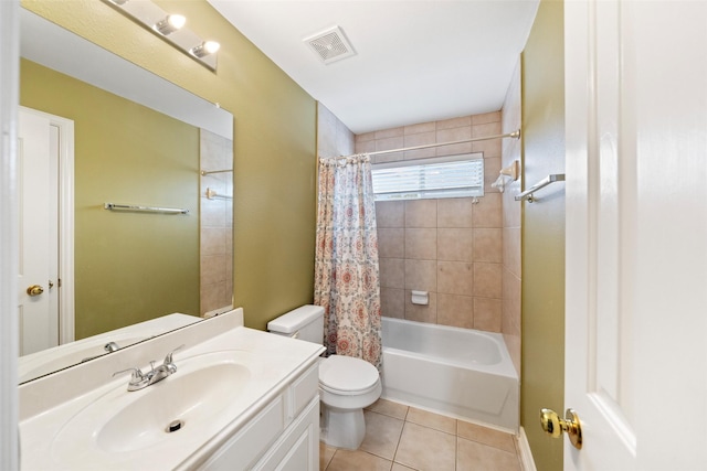 full bathroom with vanity, tile patterned floors, toilet, and shower / tub combo with curtain