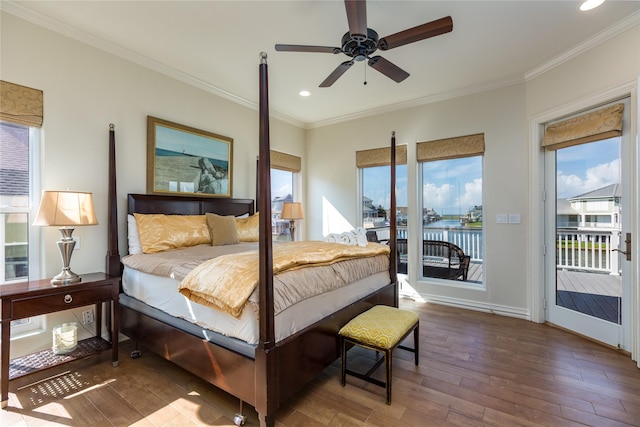 bedroom with crown molding, hardwood / wood-style flooring, ceiling fan, a water view, and access to outside