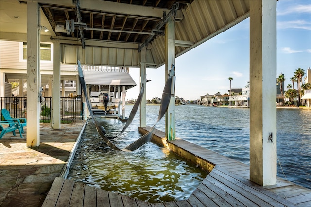 dock area with a water view