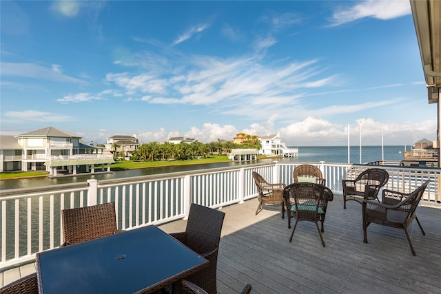 deck featuring a water view