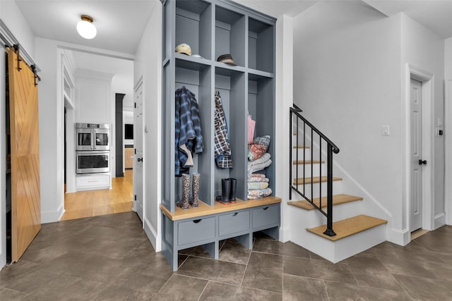 mudroom with a barn door