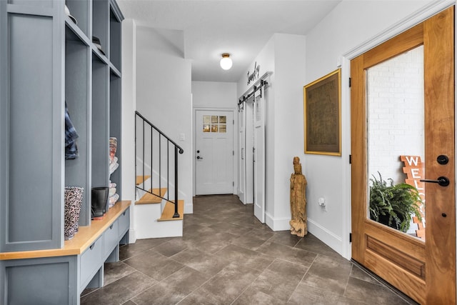 mudroom with a barn door