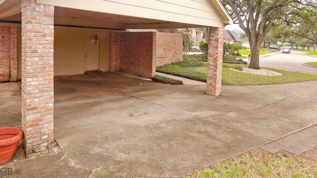 view of patio featuring a carport