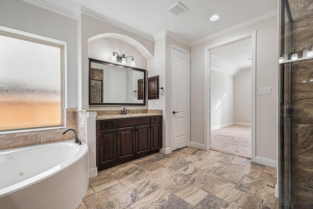 bathroom featuring vanity, crown molding, shower with separate bathtub, and a healthy amount of sunlight