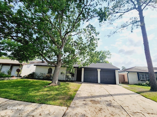 single story home with a garage and a front yard