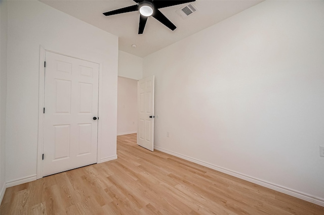 unfurnished bedroom featuring ceiling fan and light wood-type flooring