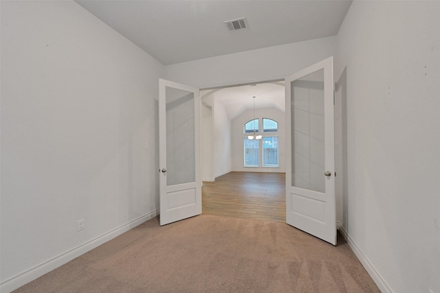 16715 Ramsay Cascades Dr, Humble, TX 77346 - spare room with baseboards, carpet, and lofted ceiling