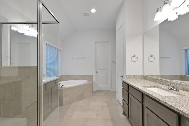 16715 Ramsay Cascades Dr, Humble, TX 77346 - full bath featuring a garden tub, a stall shower, vanity, vaulted ceiling, and recessed lighting
