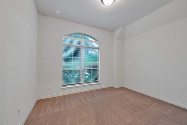 16715 Ramsay Cascades Dr, Humble, TX 77346 - unfurnished room featuring carpet, baseboards, and a smoke detector