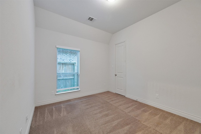 16715 Ramsay Cascades Dr, Humble, TX 77346 - unfurnished room featuring light carpet, baseboards, and lofted ceiling
