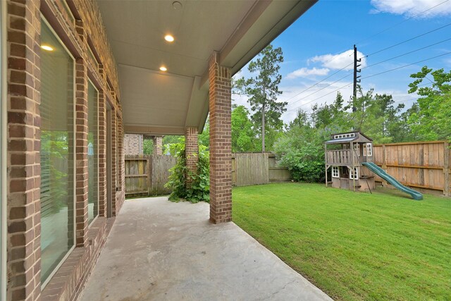 16715 Ramsay Cascades Dr, Humble, TX 77346 - view of patio featuring a playground
