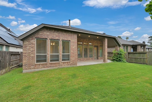 16715 Ramsay Cascades Dr, Humble, TX 77346 - rear view of property featuring brick siding and a patio