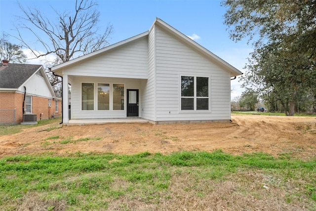 rear view of property with central air condition unit