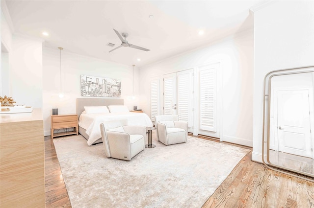 bedroom featuring ceiling fan and light hardwood / wood-style floors