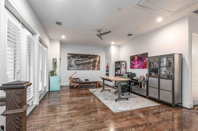 office area featuring ceiling fan and dark wood-type flooring