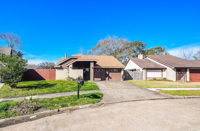 1478 Willow Wisp Dr, Missouri City, TX 77489 - view of front of property featuring driveway, a gate, brick siding, and an attached garage