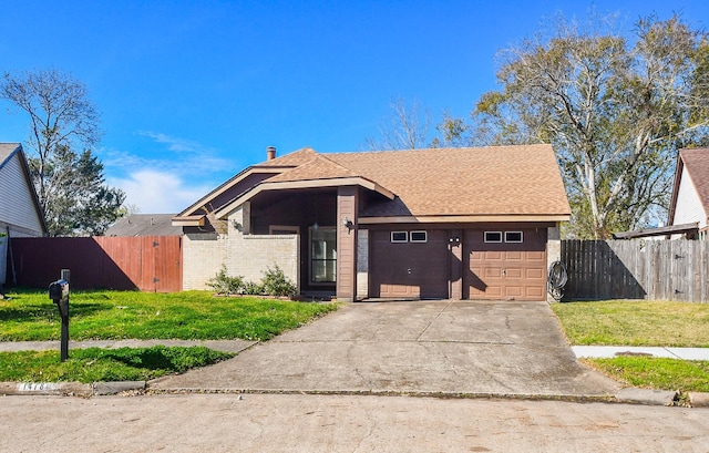 view of front facade featuring concrete driveway, roof with shingles, an attached garage, fence, and a front lawn