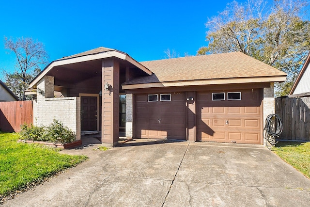 1478 Willow Wisp Dr, Missouri City, TX 77489 - view of front of home with a garage, roof with shingles, and concrete driveway