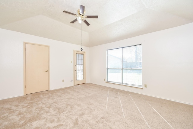 1478 Willow Wisp Dr, Missouri City, TX 77489 - empty room with a ceiling fan, carpet, lofted ceiling, and baseboards
