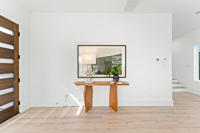 entrance foyer with light wood-type flooring