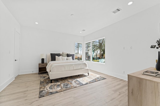 bedroom featuring light hardwood / wood-style floors