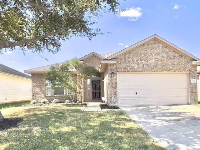 view of front facade with a garage and a front lawn