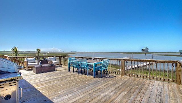 deck featuring a water view and an outdoor hangout area