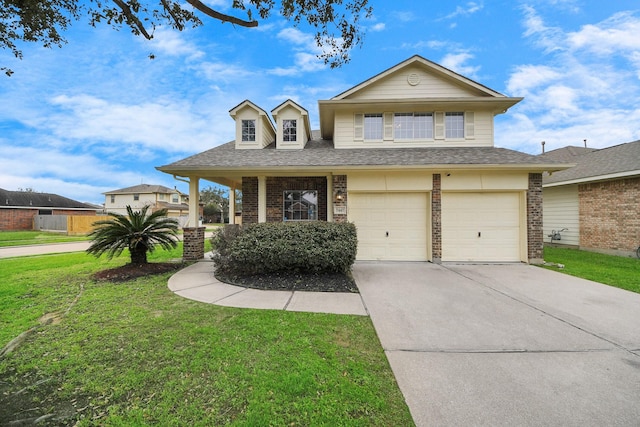 view of front of property featuring a garage and a front lawn