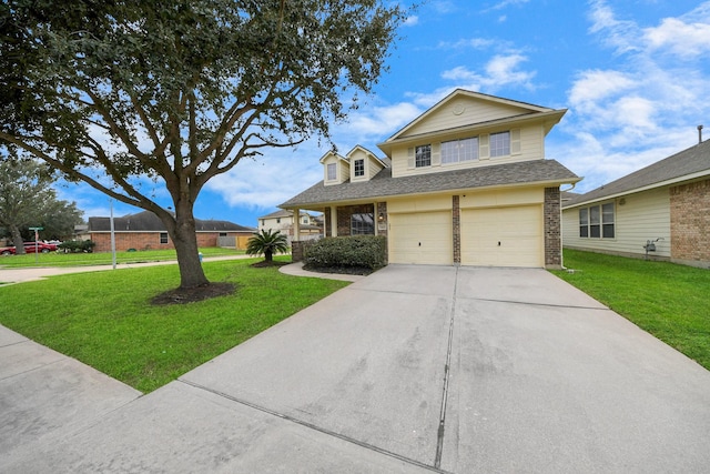 view of front of house with a garage and a front yard