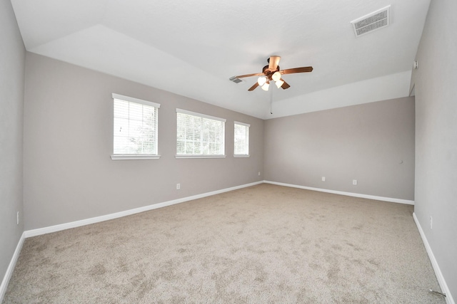 carpeted empty room with ceiling fan