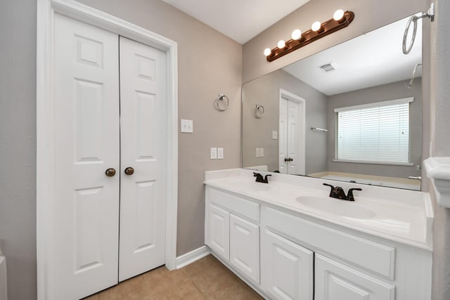 bathroom featuring vanity and tile patterned floors