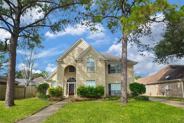 view of front of home with a front lawn