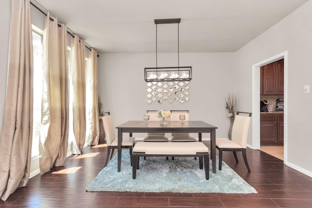 dining room featuring a notable chandelier