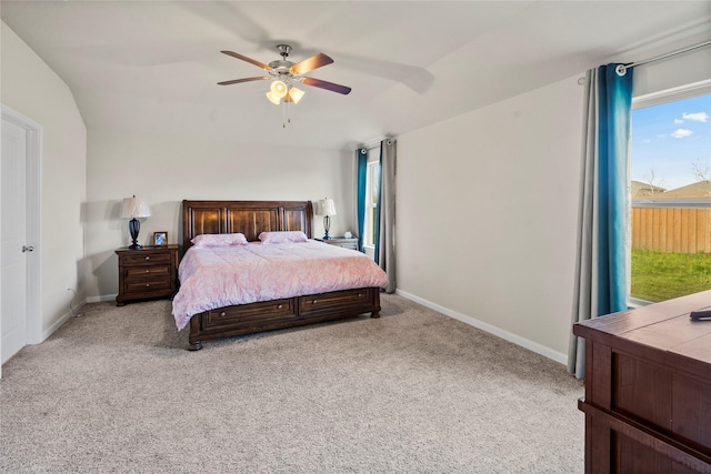 bedroom featuring ceiling fan and light carpet