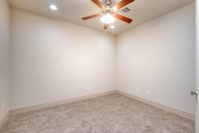 spare room with ceiling fan