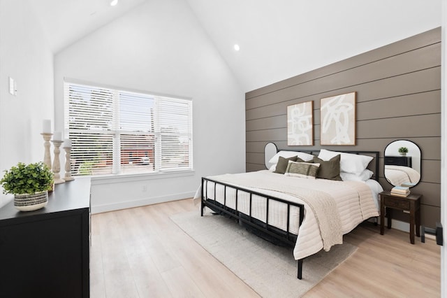 501 E 39th St, Houston, TX 77022 - bedroom with recessed lighting, light wood finished floors, and high vaulted ceiling