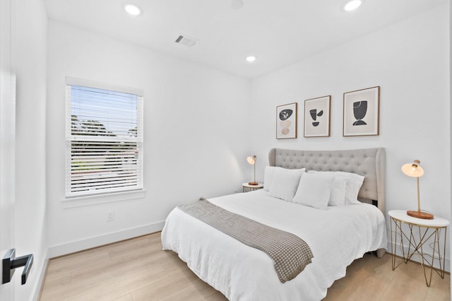 501 E 39th St, Houston, TX 77022 - bedroom featuring wood finished floors and recessed lighting